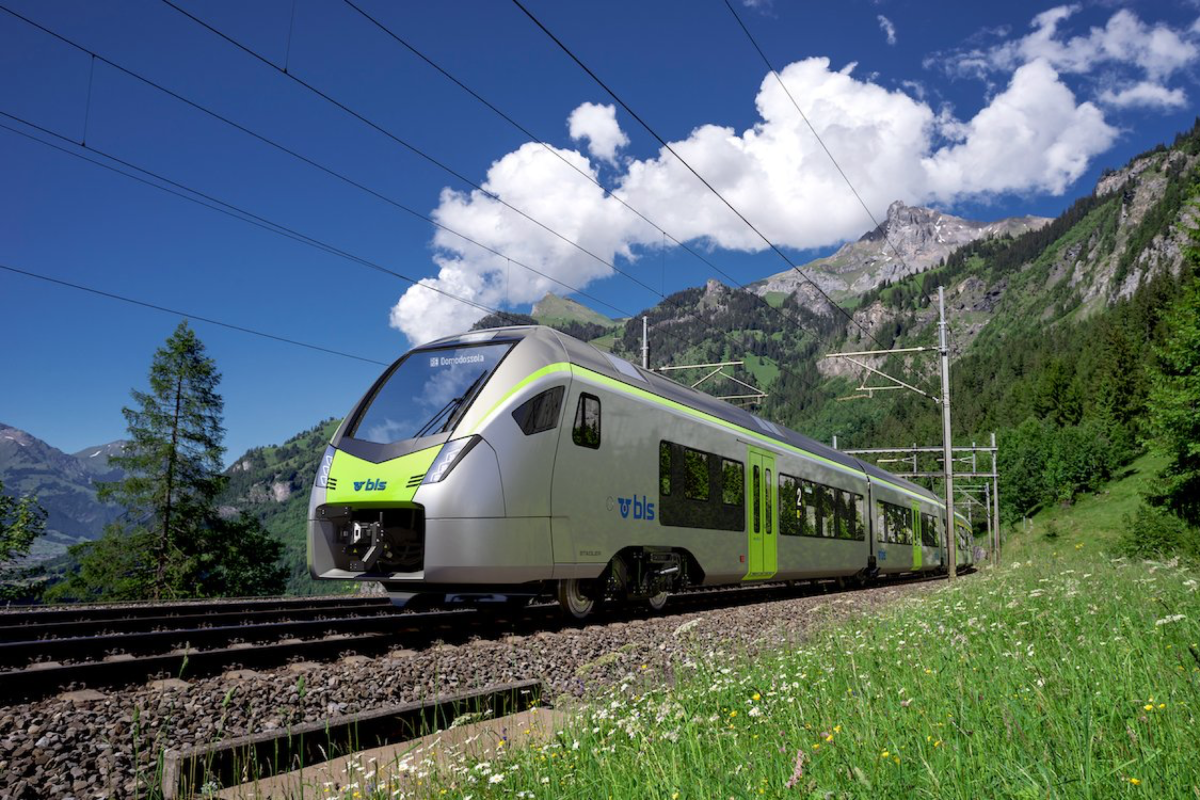 Train passing through mountainous countryside